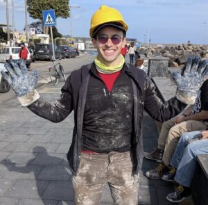 Cyclone Harry Sicily Francesco Messina picture showing dirty hands and clothes after helping in clean up